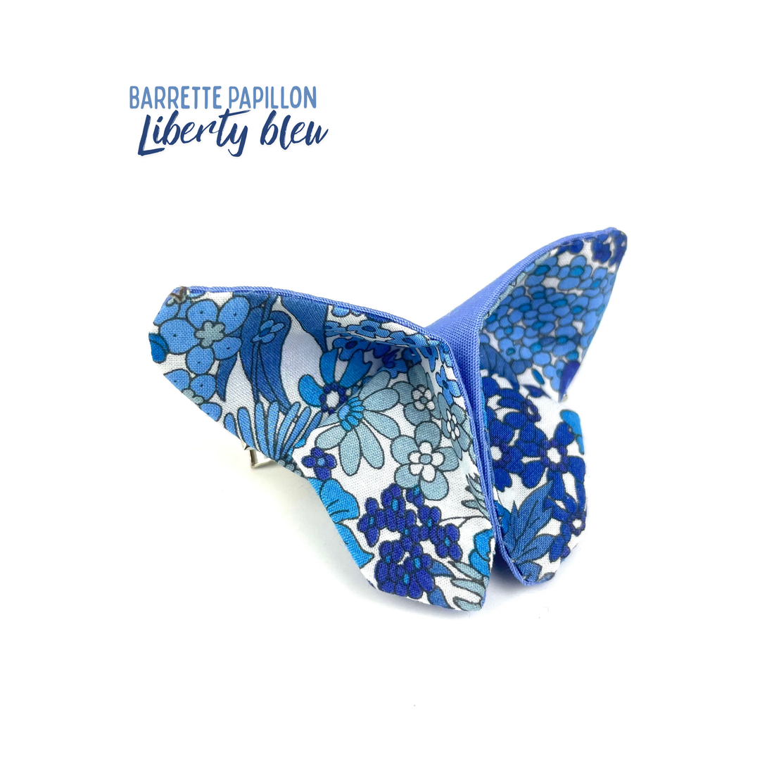 Barrette papillon Liberty bleu